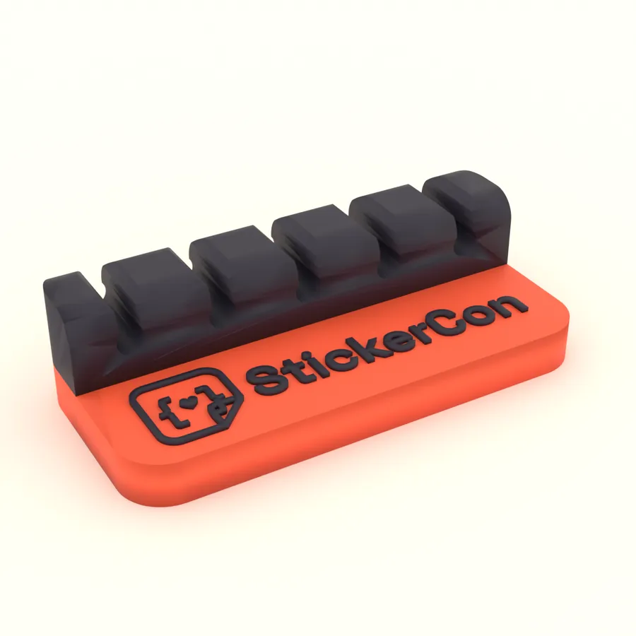 3D printed desk cable dock with five black cable slots on a coral base with a raised StickerCon logo